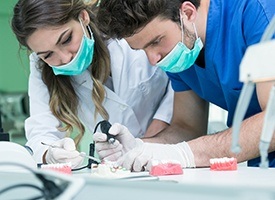 Team members working in dental lab